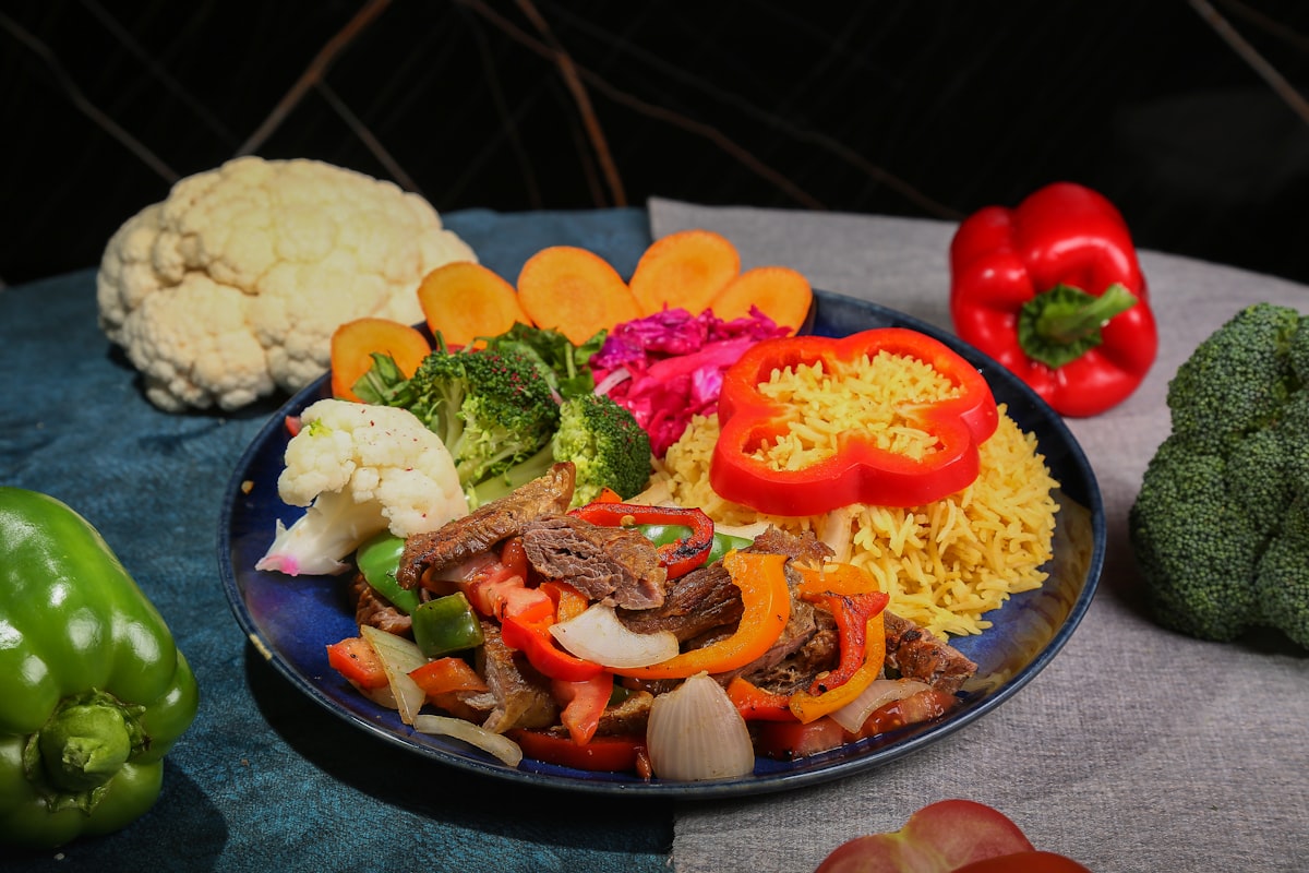 Healthy balanced meal with vegetables, proteins, and whole grains